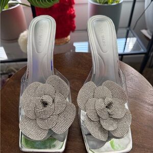 Elegant Silver Flower Embellished Mules by Clear Wang